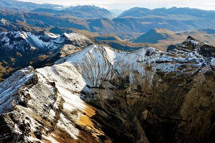 An aerial view of the rugged Andes Mountains in South America — the Andes are the longest mountain range in the world, running 4,300 miles along the entire western coast of South America.